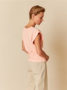 Camiseta desmangada color peonía 