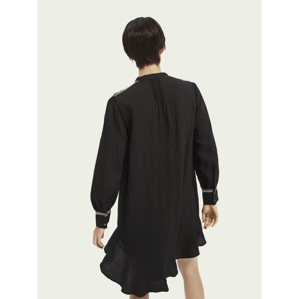 Vestido estilo peplum con bordados