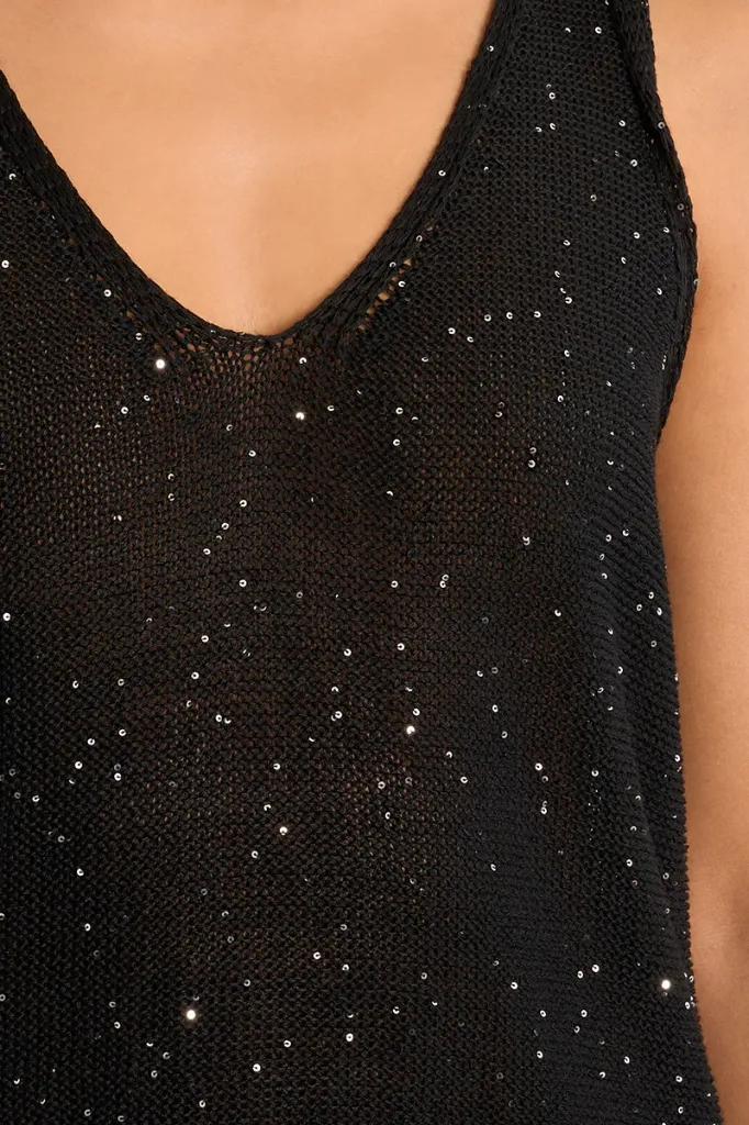 top-de-mujer-de-manga-sisa-con-lunares-brillantes- (4).webp