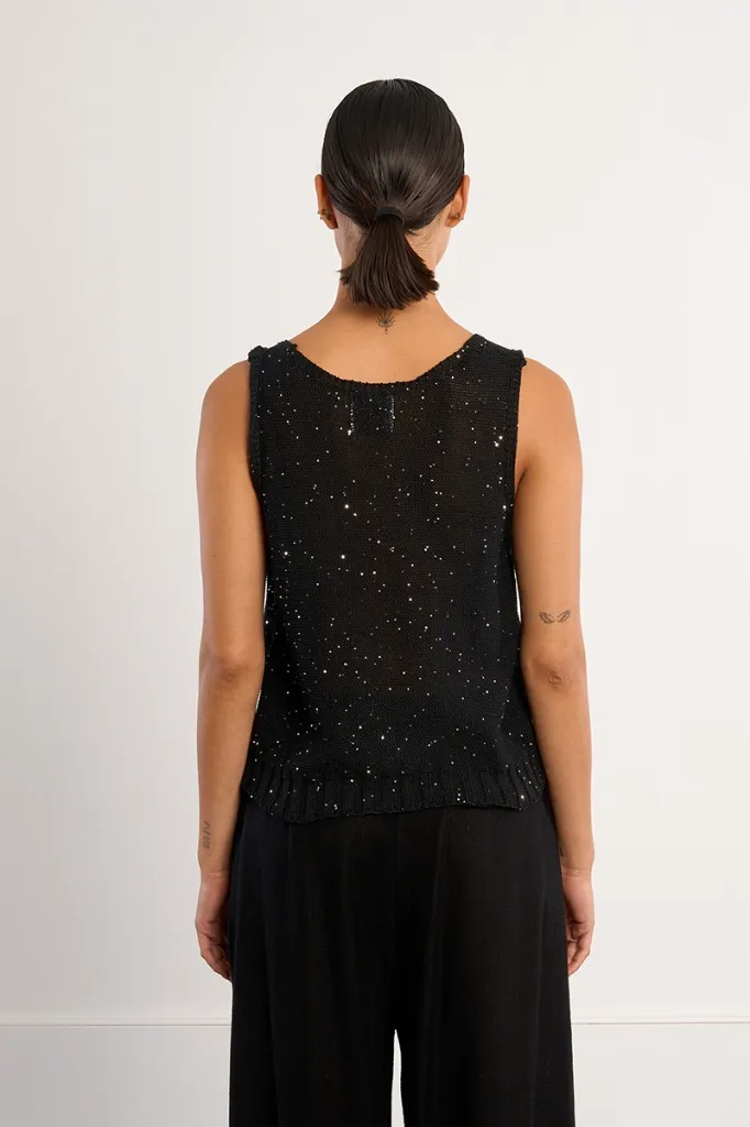 top-de-mujer-de-manga-sisa-con-lunares-brillantes- (1).webp