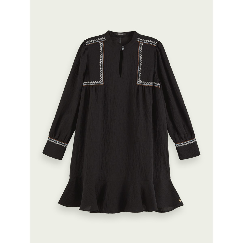 Vestido estilo peplum con bordados