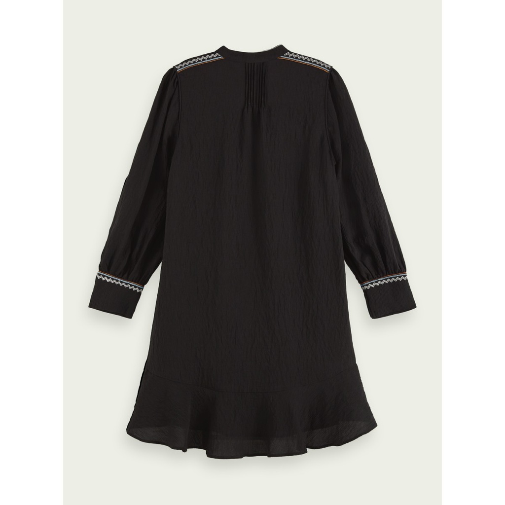 Vestido estilo peplum con bordados