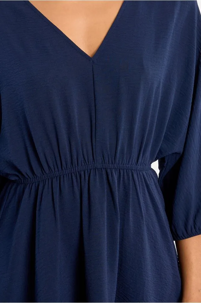 vestido-corto-de-manga-larga-detalle-pliegues- (4).webp