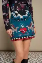 Falda estampado místico con gatos alados y corazones